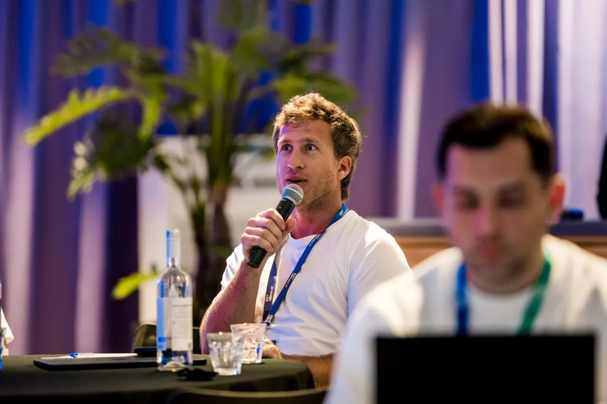 Juan Pablo Pereira speaking at a conference