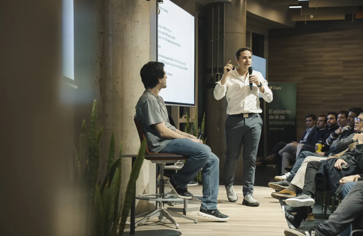 Juan Olloniego and Martín Alcalá in conversation on stage